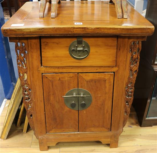 A Chinese hardwood low cupboard W.63cm